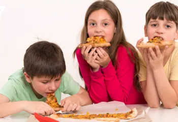 Picture of children eating pizza