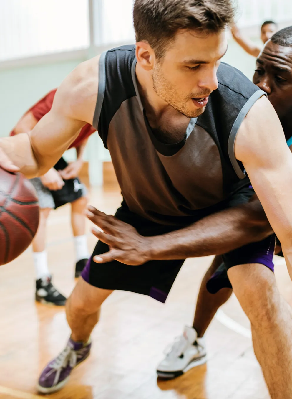 men playing basketball