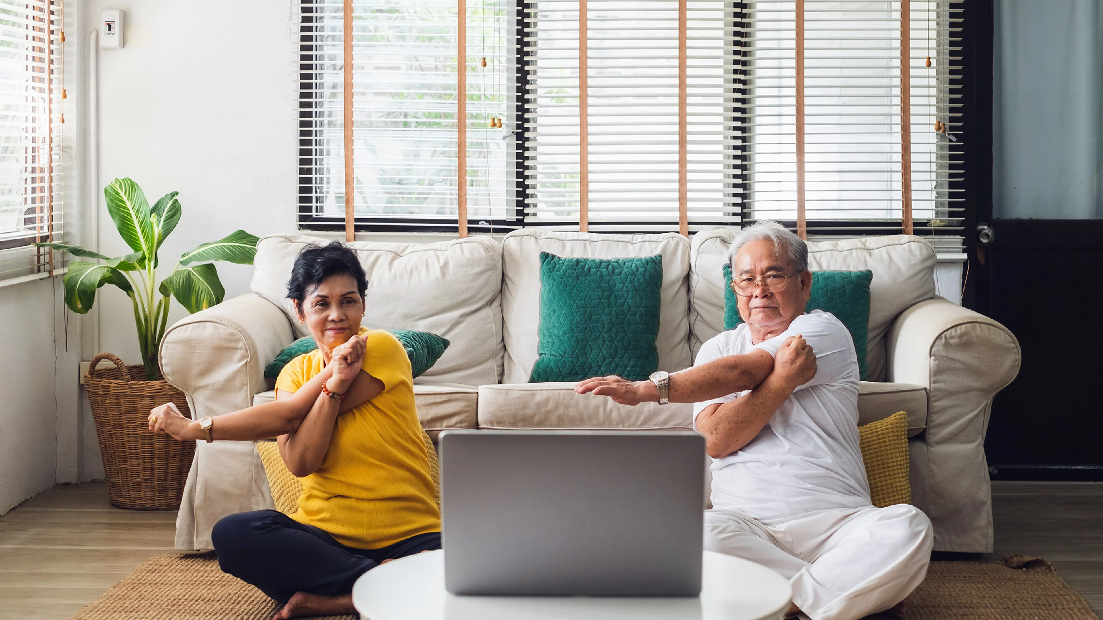 couple doing yoga virtually