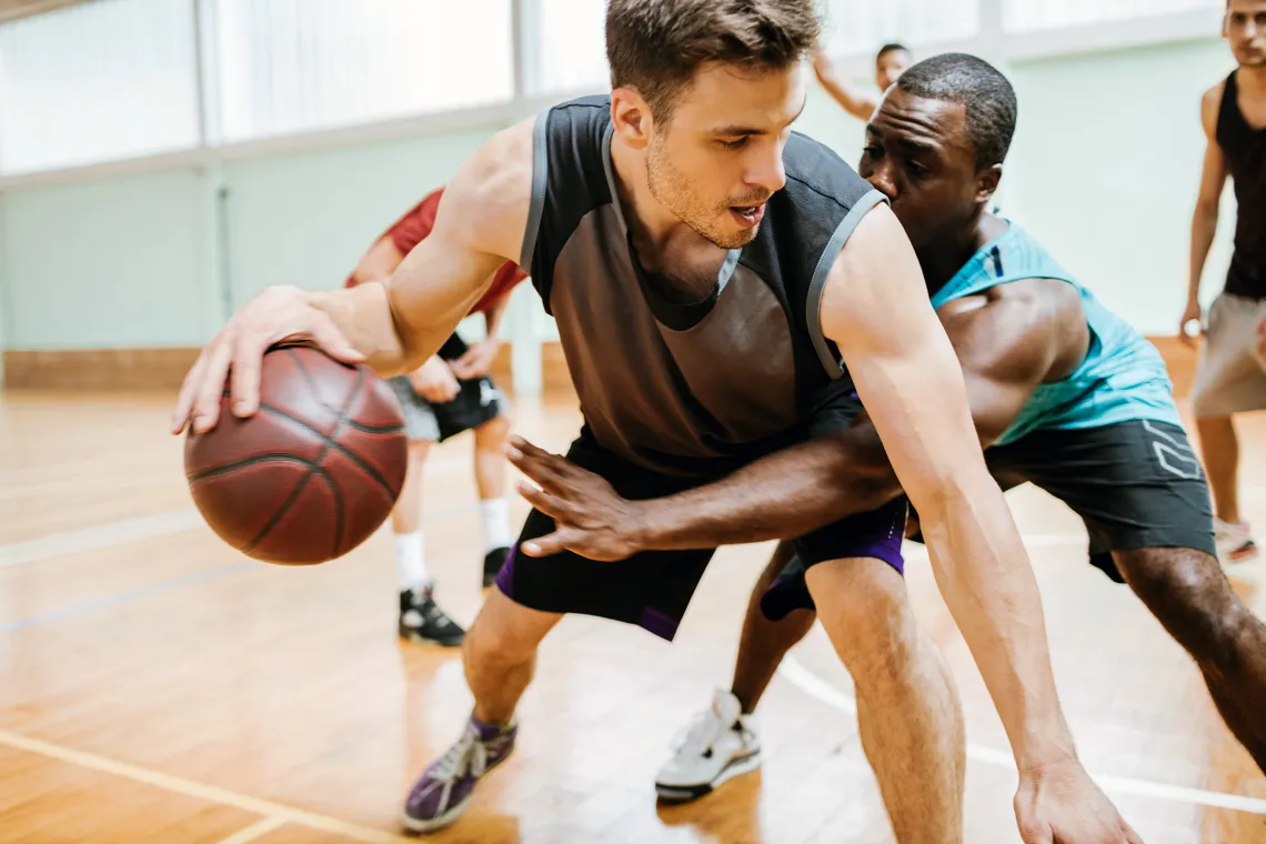 men playing basketball